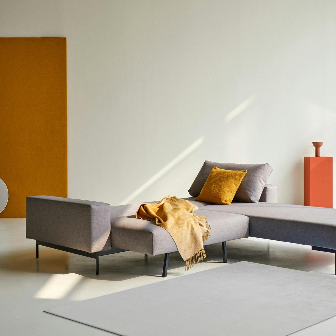 graues Klappsofa L-Form